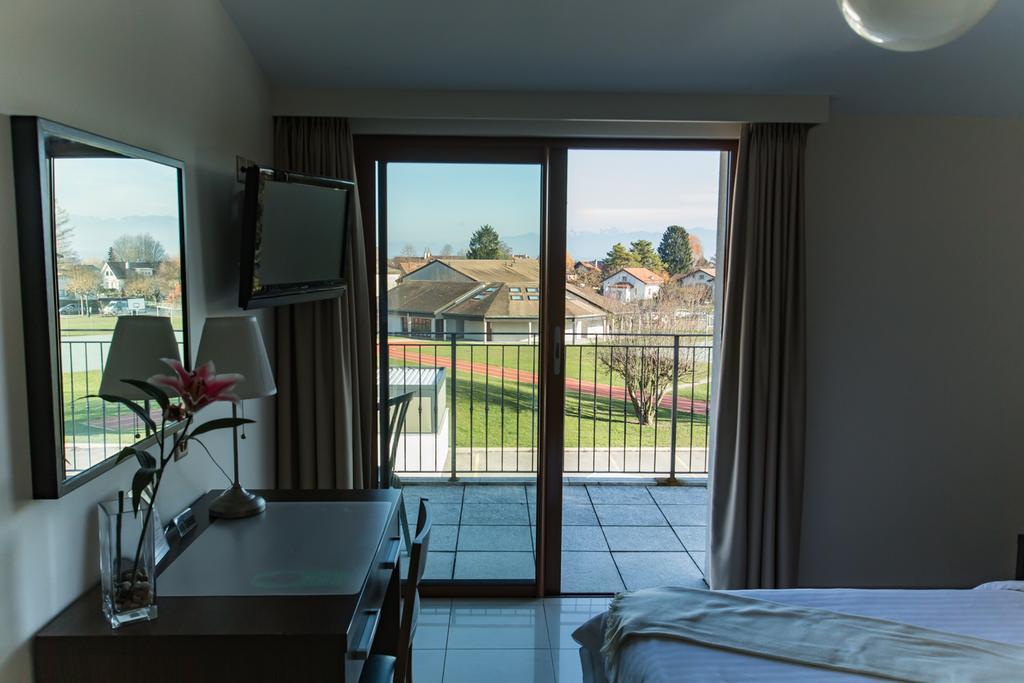 Motel Le Leman Commugny Bagian luar foto