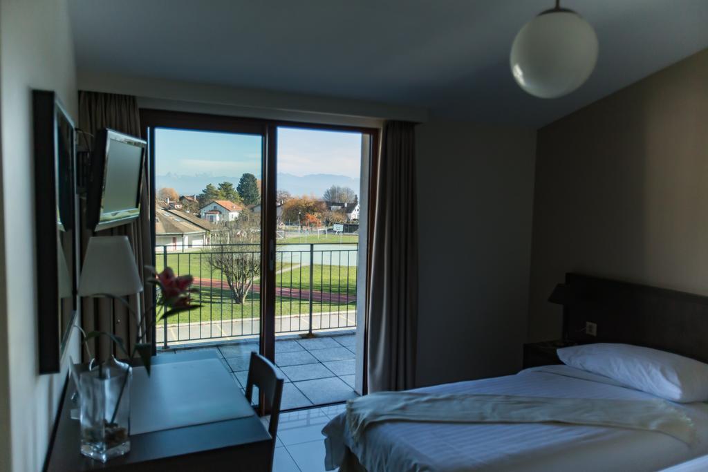 Motel Le Leman Commugny Bagian luar foto